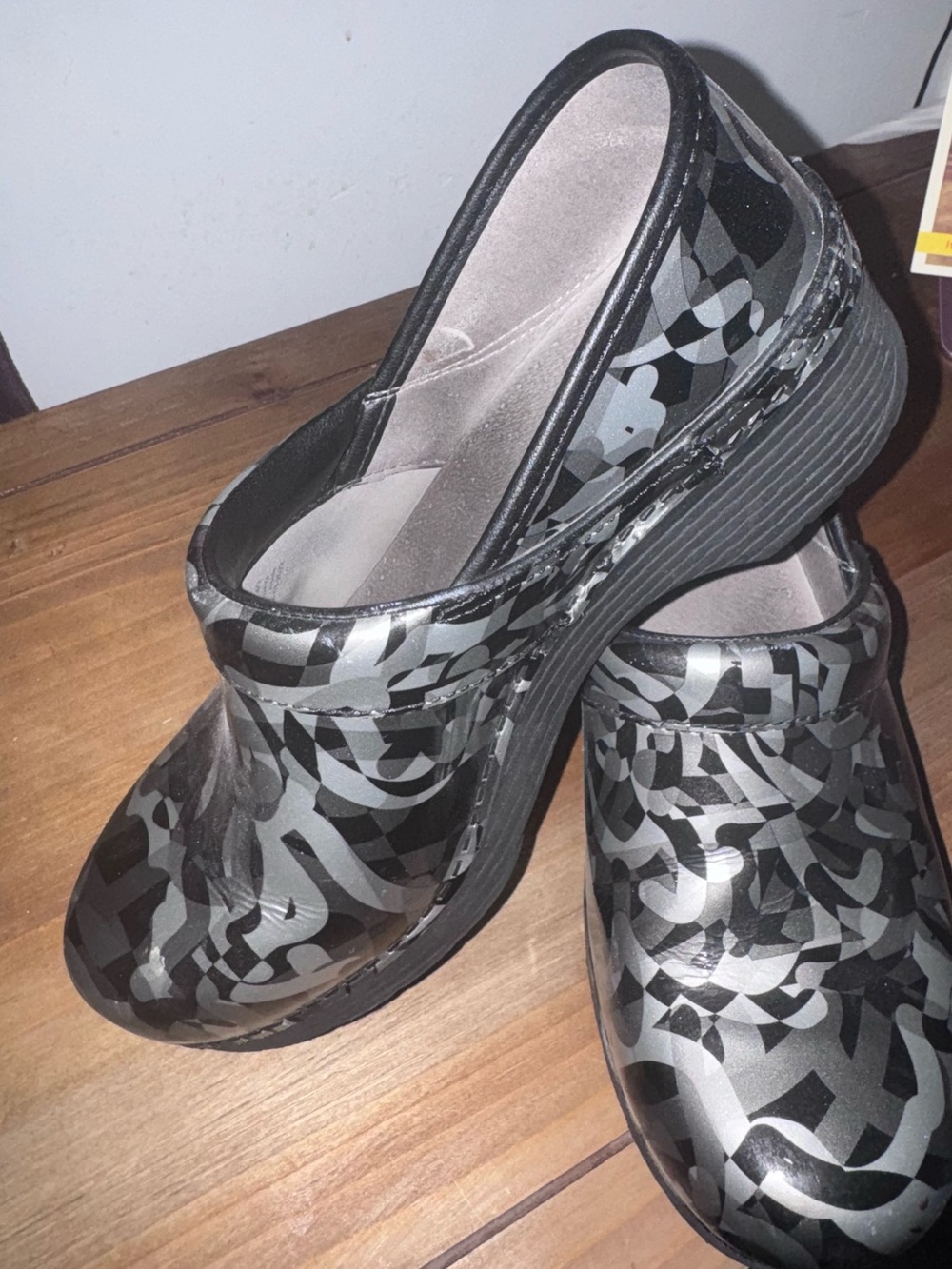 Dansko Black and Gray Patterned Slip-On Clogs